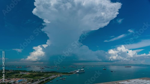 Giant cumulonimbus clouds explode at the ocean - 4K59.94p timelapse video.