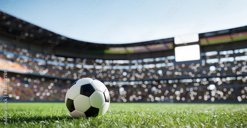 Naklejka Football soccer ball on grass field on stadium