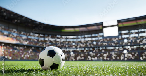 Football soccer ball on grass field on stadium © Photocreo Bednarek
