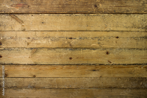 Wooden background. Background from old boards. Wood planks stacked together
