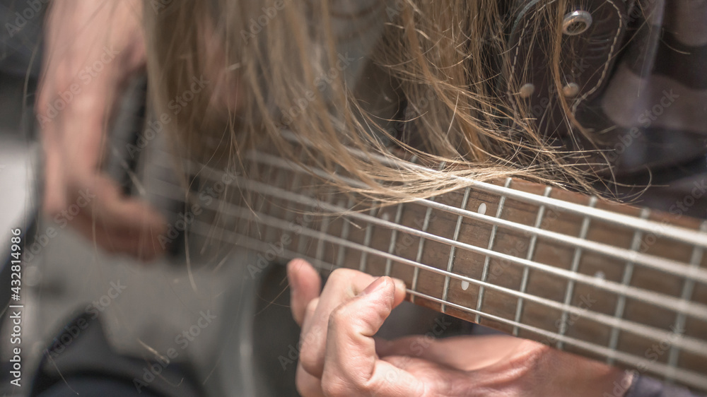 Fototapeta premium musician playing guitar, close up