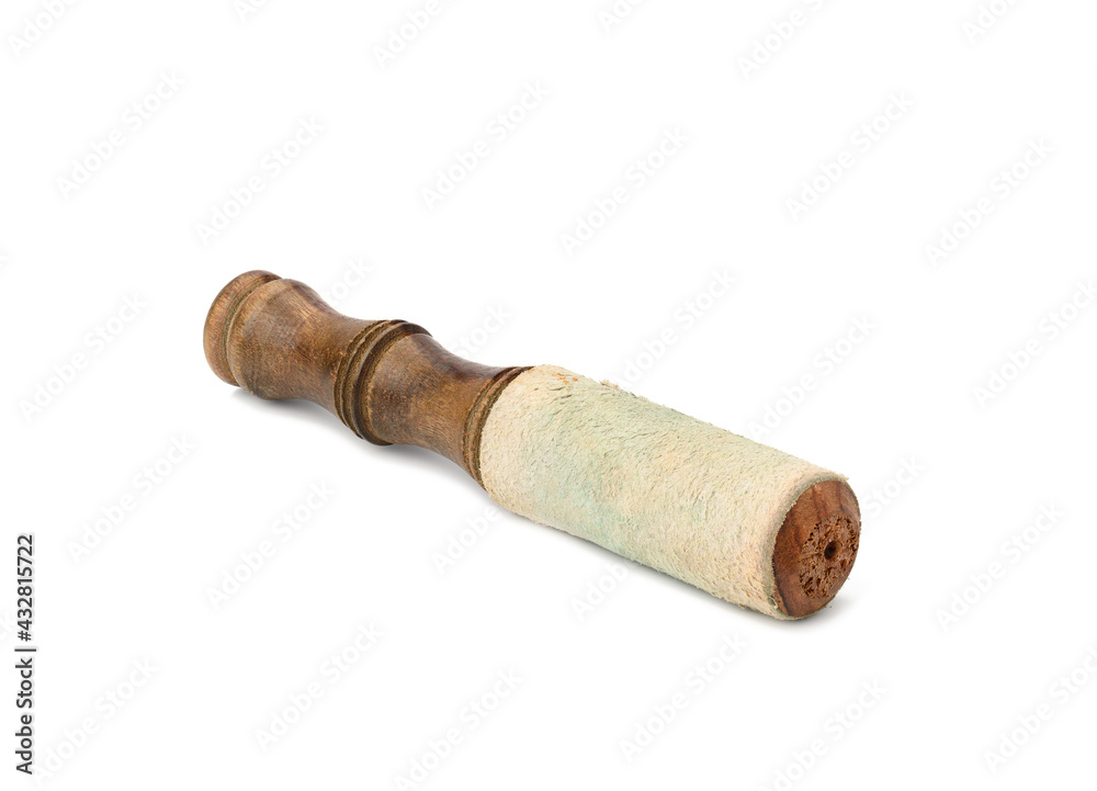wooden stick which is covered with leather clapper to strike the Tibetan singing bowls wooden stick which is covered with leather clapper to strike the Tibetan singing bowls