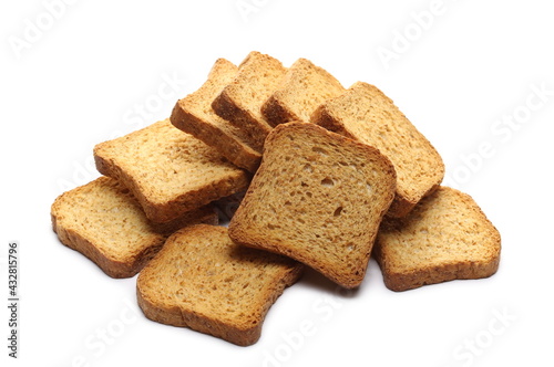 Wholemeal crackers, bread rusks pile, toast slices isolated on white background