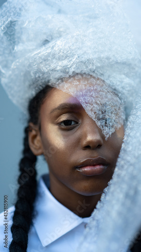 Closeup of Young Girl wearing recycled headdress