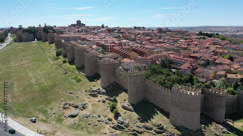 Aerial view of imposing stone defensive walls around historic Spanish city of Avila  photo