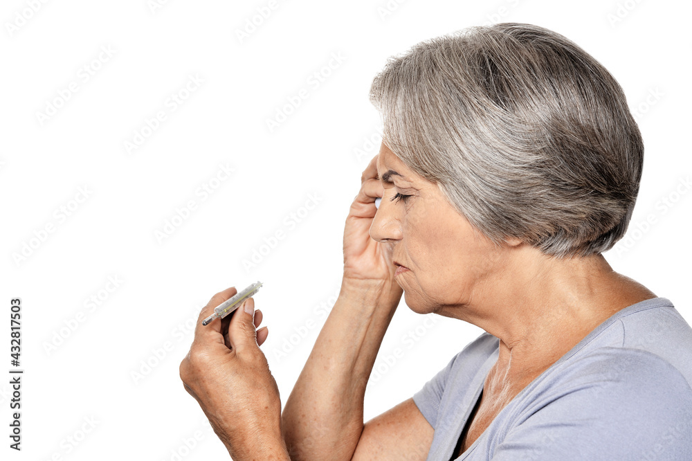 ill beautiful senior woman with thermometer isolated on white background ill beautiful senior woman with thermometer isolated on white background