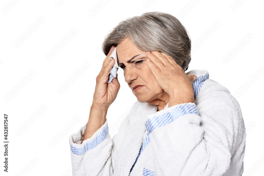 serious senior woman with headache, isolated on white serious senior woman with headache, isolated on white