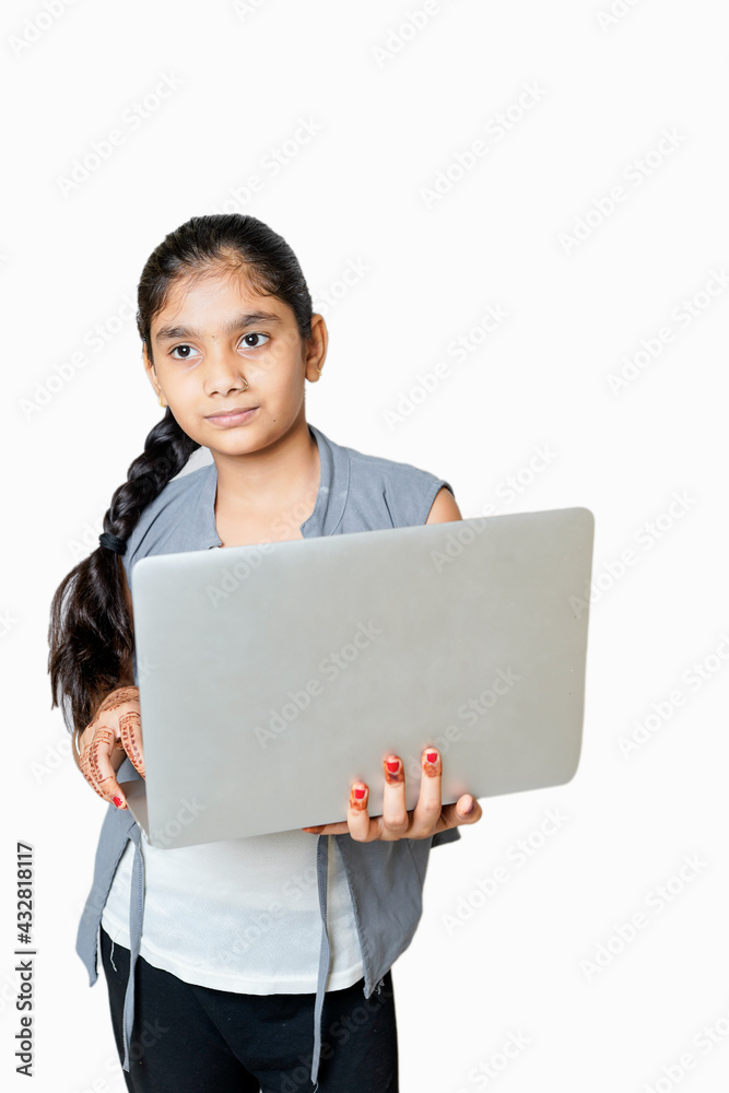 indian girl attending online school , due to cavide-19. indian girl attending online school , due to cavide-19.