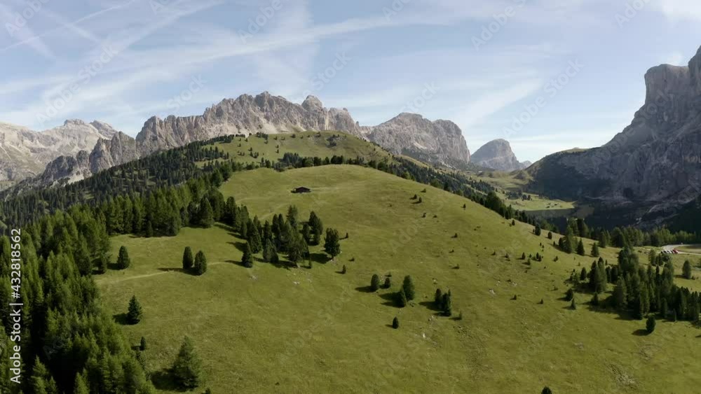 Serpentine in the Italian Alps mountains. Gardena pass,Passo Gardena, Rifugio Frara, Dolomiti, Dolomites, South Tyrol, Italy, UNESCO World Heritage. Aerial amazing shot. View from above. Serpentine in the Italian Alps mountains. Gardena pass,Passo Gardena, Rifugio Frara, Dolomiti, Dolomites, South Tyrol, Italy, UNESCO World Heritage. Aerial amazing shot. View from above.