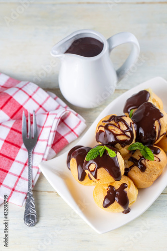 Delicious profiteroles with...