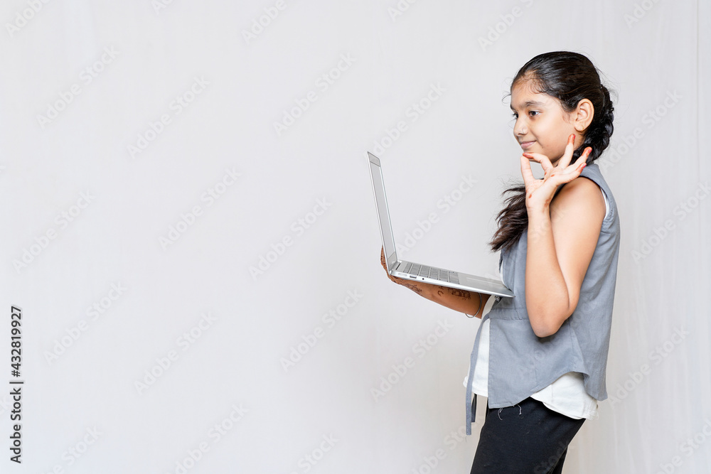 indian girl attending online school , due to cavide-19. indian girl attending online school , due to cavide-19.