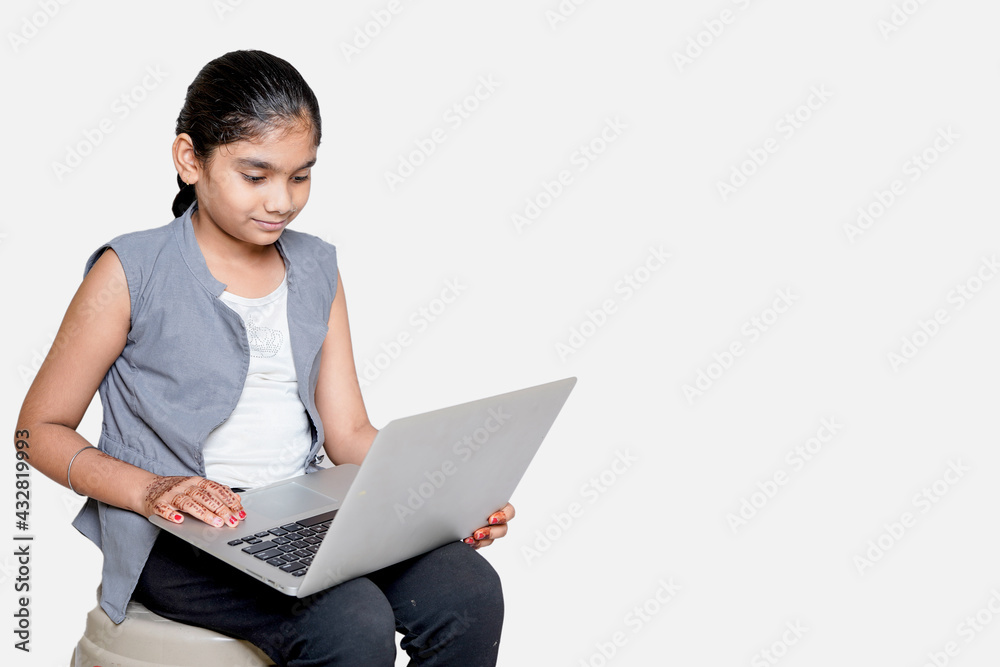 indian girl attending online school , due to cavide-19. indian girl attending online school , due to cavide-19.