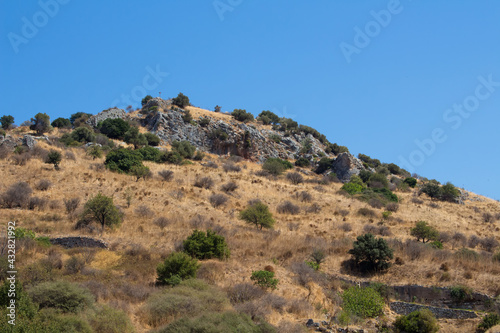 View of Aegean landscape and clear, blue sky in the background capture in Turkey. © theendup