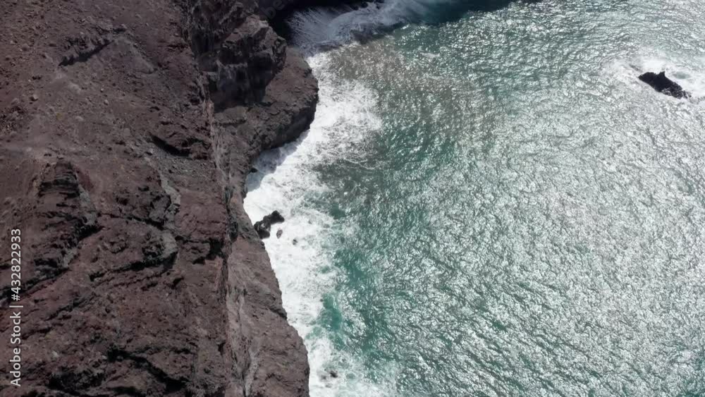 Aerial view of the Sea port and beach of La Aldea in the municipality of La Aldea de San Nicolas (Canary Islands, Spain, Europe) Aerial view of the Sea port and beach of La Aldea in the municipality of La Aldea de San Nicolas (Canary Islands, Spain, Europe)