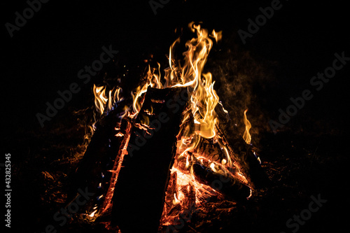 small fire slowly eats wood