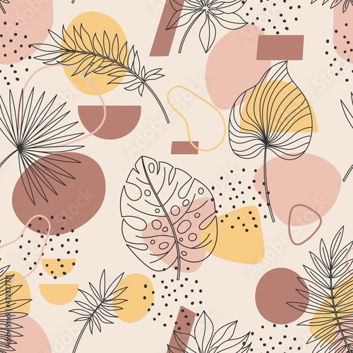 Abstract palm leaves seamless background