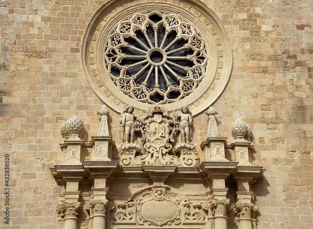 details of Romanesque architecture on the facade of the Cathedral of Santa Maria Annunziata.