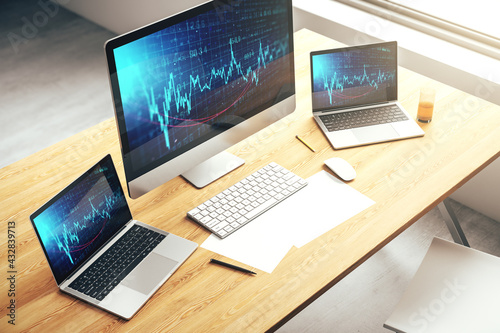 Abstract creative financial graph on modern laptop screen, forex and investment concept. 3D Rendering