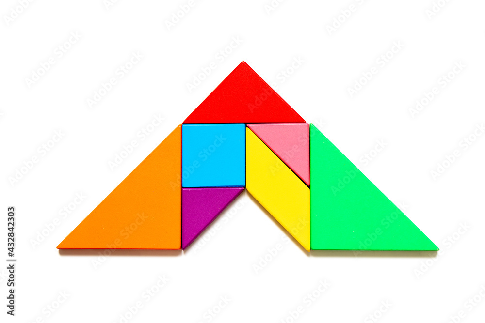 Color tangram puzzle in arrow shape on white background Color tangram puzzle in arrow shape on white background