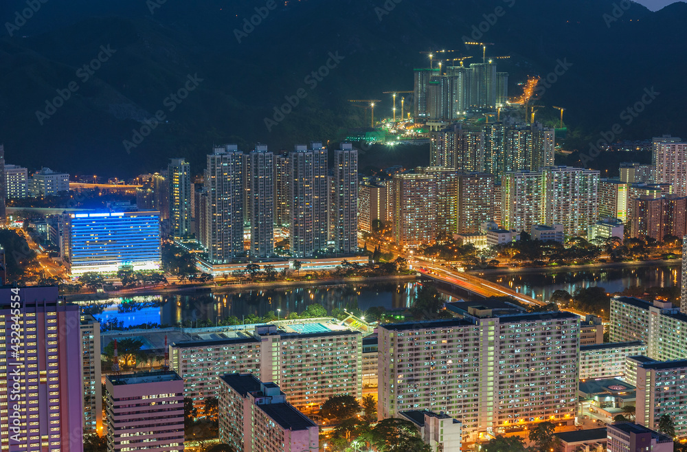 Naklejka premium Aerial view of residential district of Hong Kong city at night