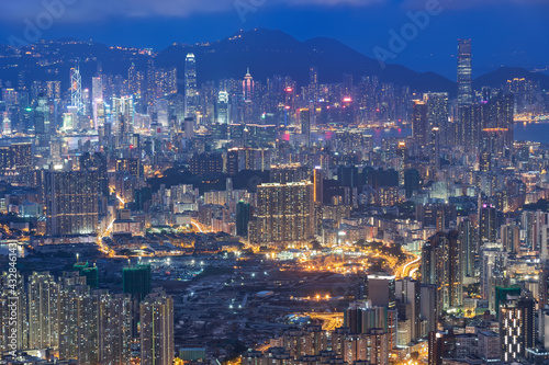 Aerial view of Hong Kong city at night © leeyiutung