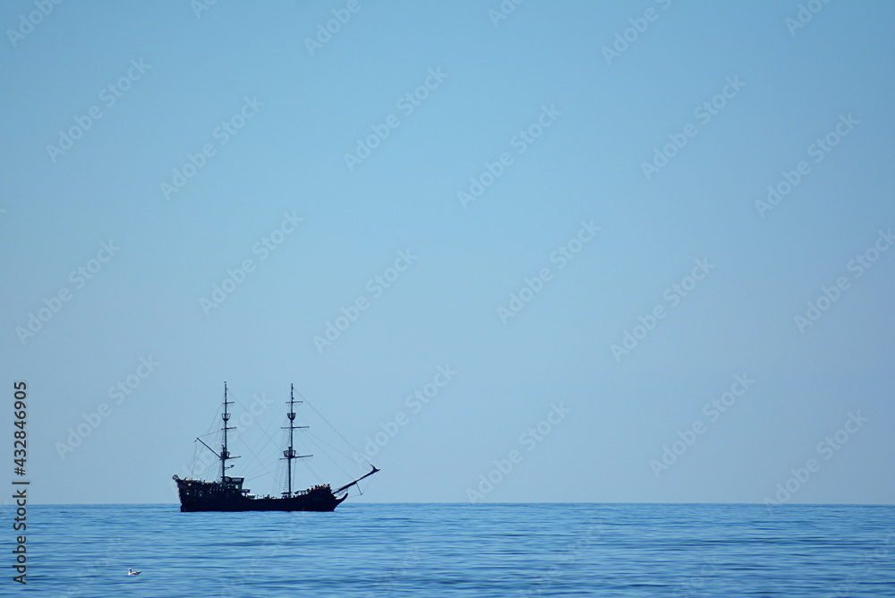 ship at sea, a ship that looks like a pirate ship