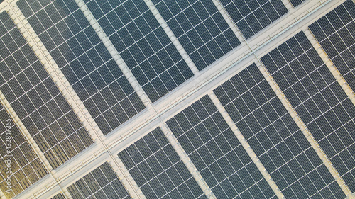 Aerial view of a solar panel on building roof top. Part of reduce reuse and restore, Renewable energy concept 