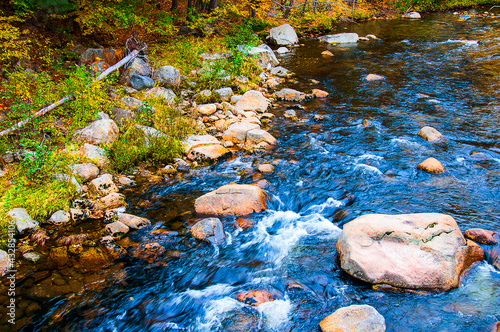 The Rivers, Lakes and Mountains of the New England States in Autumn.You can cruise on the lakes as the leaves turn red and golden.We crossed Lakes Winnipasukee, Champlain and  Placid on our journey photo