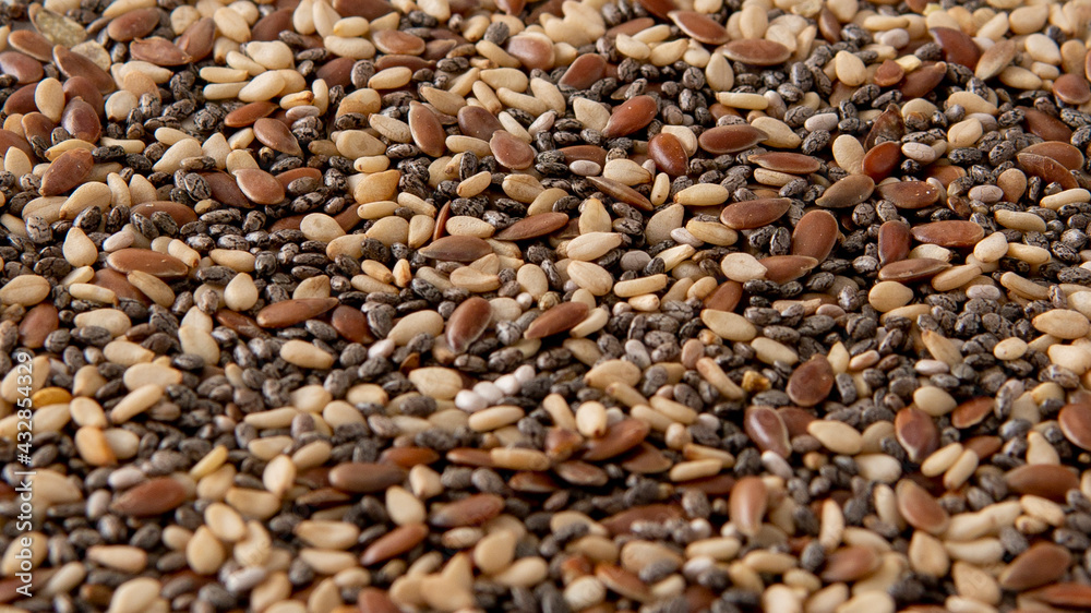 Close view of chia, flax and sesame seeds mix background Close view of chia, flax and sesame seeds mix background