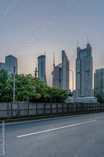 The modern architectures in Shanghai, China, at sunset.