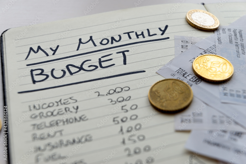 Page of notepads with monthly expense budgets, with receipts and invoices beside them, and coins. Monthly budget.
Page of notepads with monthly expense budgets, with receipts and invoices beside them, and coins. Monthly budget.