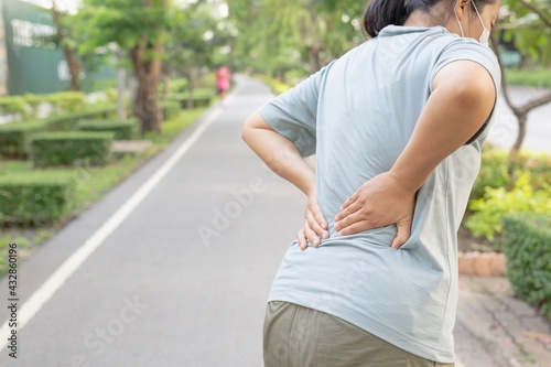 Women have backaches because of heavy lifting.