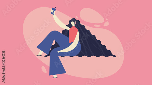 Modern girl with long, curly hair holding a drink while smiling