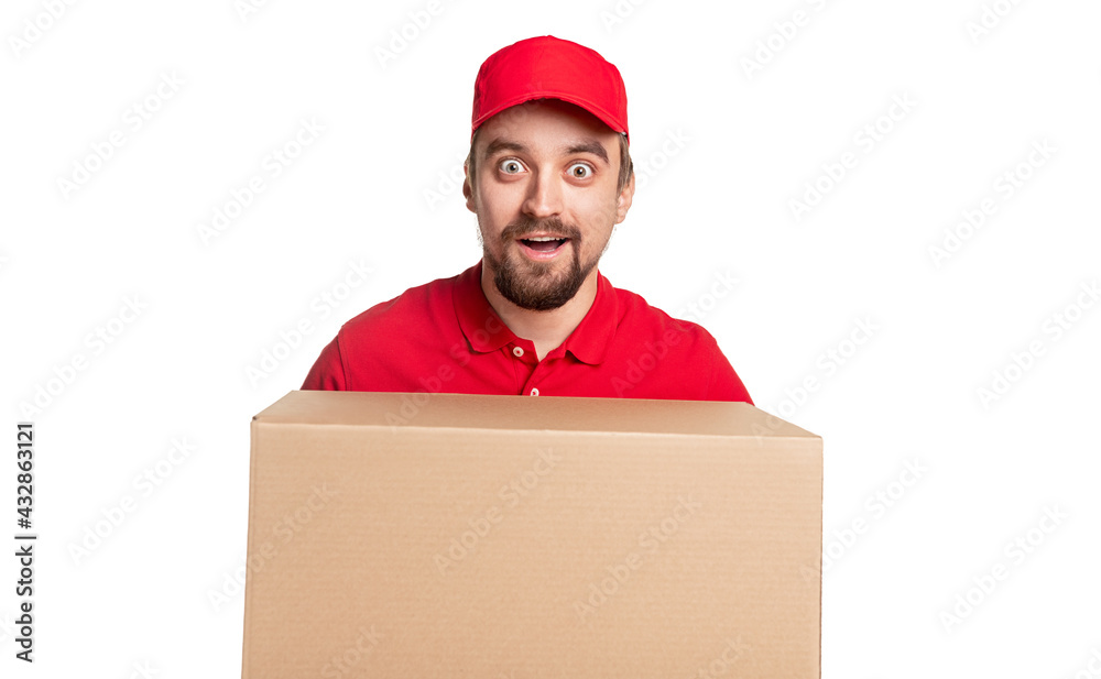 Delivery man with carton box in studio Delivery man with carton box in studio