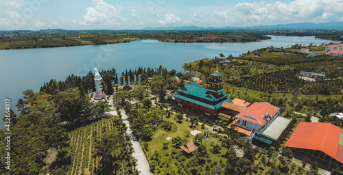 Aerial view of Hoa Nghiem Pagoda in Bao loc city, Lam Dong province, Vietnam. This pagoda is located on Bao Lam lake. photo