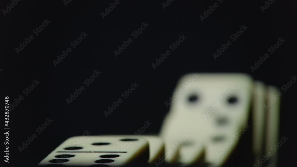 Footage of falling domino elements - domino effect