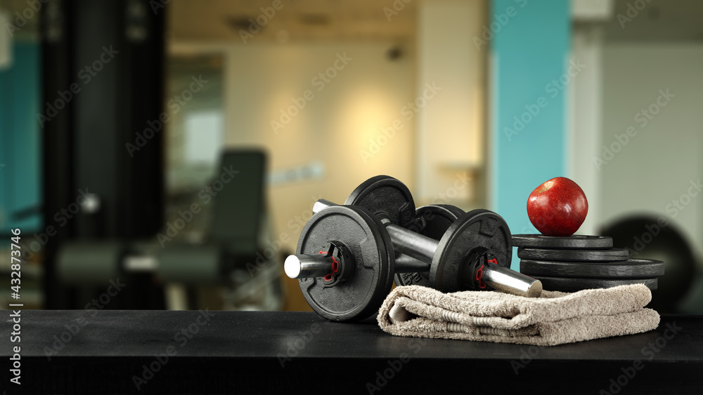 Dumbells on desk and free space for your decoration. 