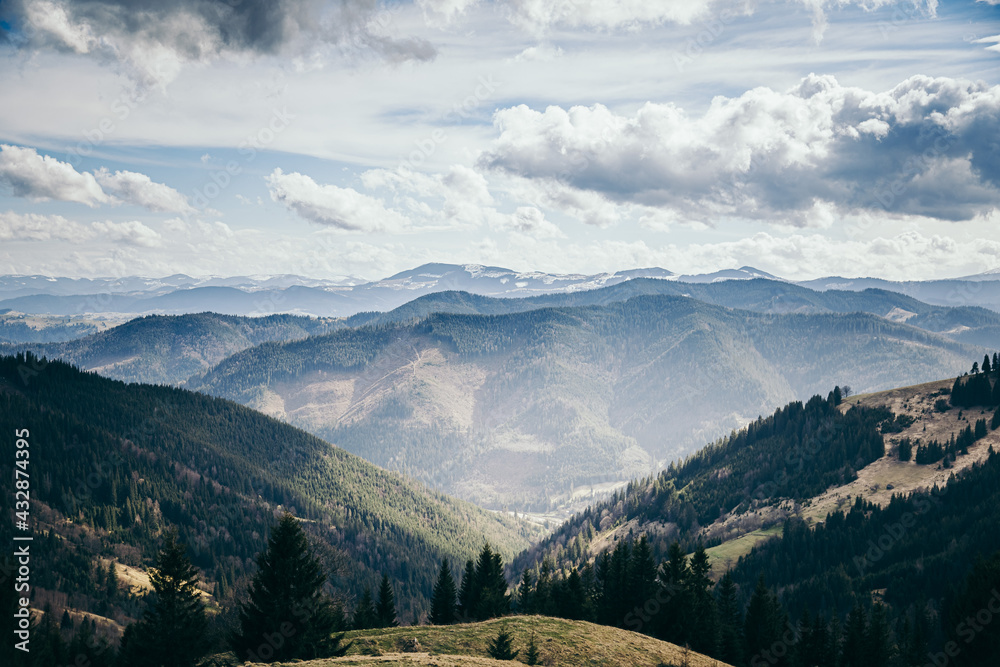 A canyon with a mountain in the background