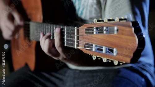 Person playing guitar