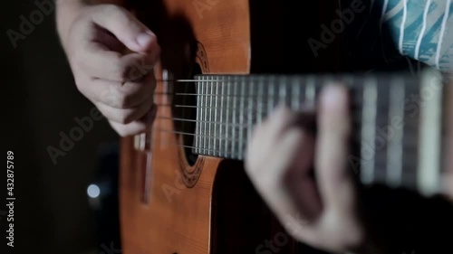 Person playing guitar