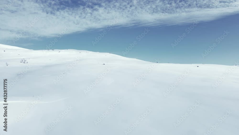 Stunning panoramic view over snow capped arctic mountains and wilderness terrain on a clear cold winters day. Stunning panoramic view over snow capped arctic mountains and wilderness terrain on a clear cold winters day.