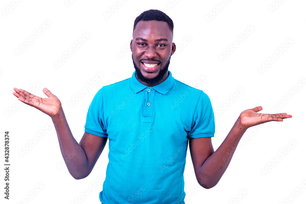 handsome young man showing something on his empty palms smiling. handsome young man showing something on his empty palms smiling.