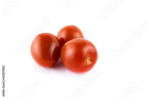 three juicy red tomatoes