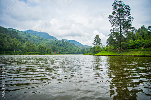 Cisanti lake, the  upstream, begining point of Citarum River in Bandung Regency, West Java, Indonesia. A beautiful natural scene in the middle of a forest. photo