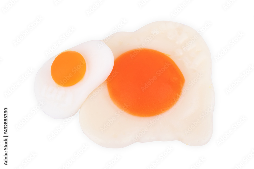 Pop art background. A lot of marmalade fried eggs on purple pastel background. Minimalism food still life Pop art background. A lot of marmalade fried eggs on purple pastel background. Minimalism food still life