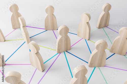 Social communication concept with light wooden figures on colorful lines at light surface background