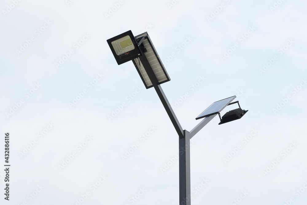 street lamp post with solar panel energy. The power of cleanliness concept. street lamp post with solar panel energy. The power of cleanliness concept.