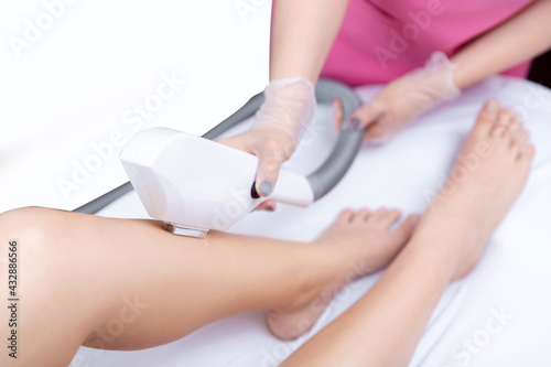 Legs laser hair removal treatment, body care woman. Concept health and beauty