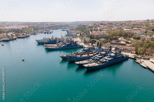 Symbol of Sevastopol, navy military ships  in sunny summer day, aerial view