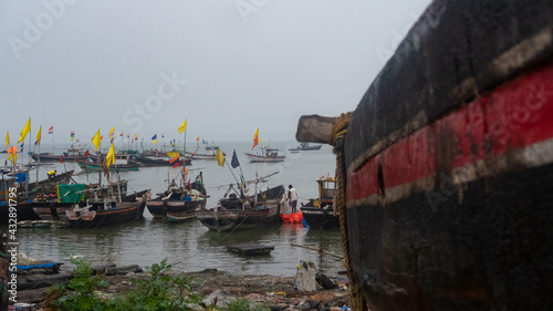 Fishing Boats and Fishermen at Korlai Revdanda Beach, Maharashtra, India photo